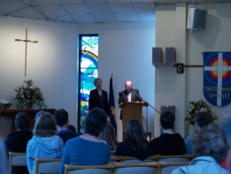 Nancy and George leading the service